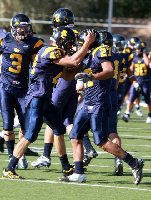 Snow captain Preston Hadley celebrates with a teammate. (Greg Dart/Snow College)