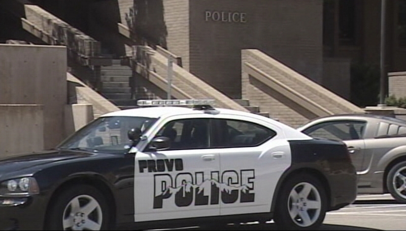 Provo officer denies pointing gun at woman