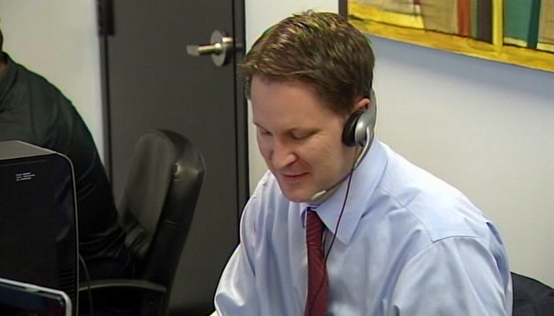 2nd Congressional District candidate Morgan Philpot (R) making phone calls to voters.