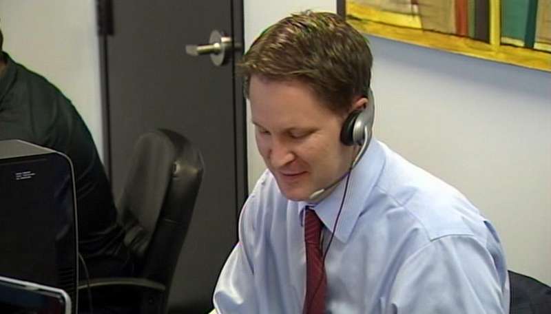 2nd Congressional District candidate Morgan Philpot (R) making phone calls to voters.