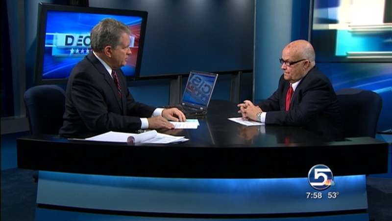 Dan Jones discussing election night's exit poll results with KSL TV's Bruce Lindsay.