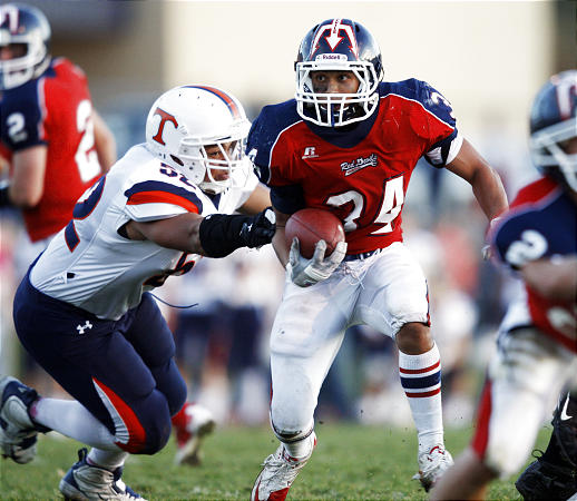 Springville running back Marcus Case, shown here playing Timpview, will lead his team against Highland. (Scott G. Winterton, Deseret News)