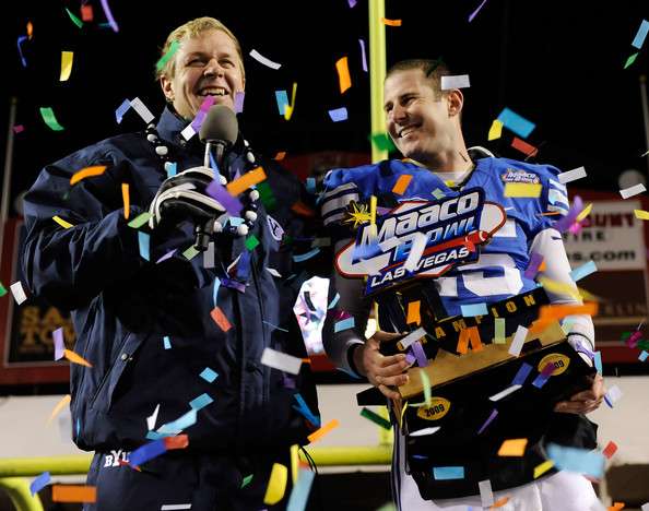 Head coach Bronco Mendenhall and quarterback
Max Hall celebrate BYU's 44-20 win over Oregon
State in the 2009 Maaco Bowl Las Vegas. (AP
Photo)