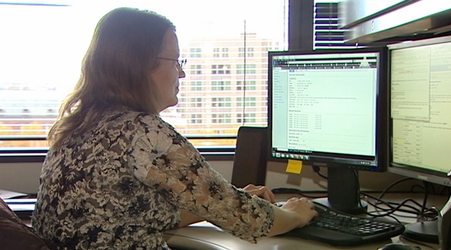 Marie Smith, who works in customer service at ksl.com, receives hundreds of e-mails, including spam.