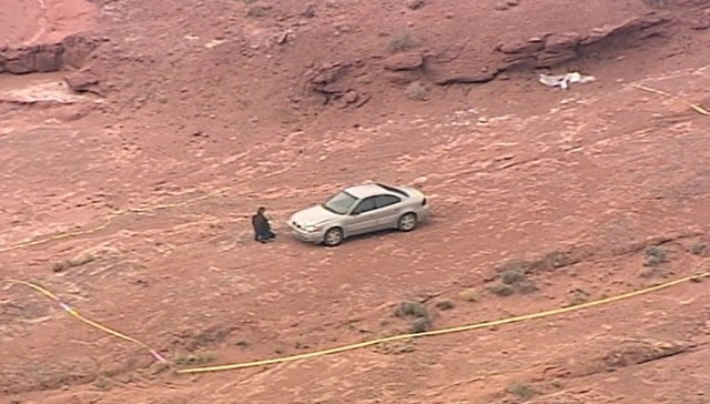 The suspect's silver Pontiac
Grand Am was found about eight miles southwest of the
shooting site
