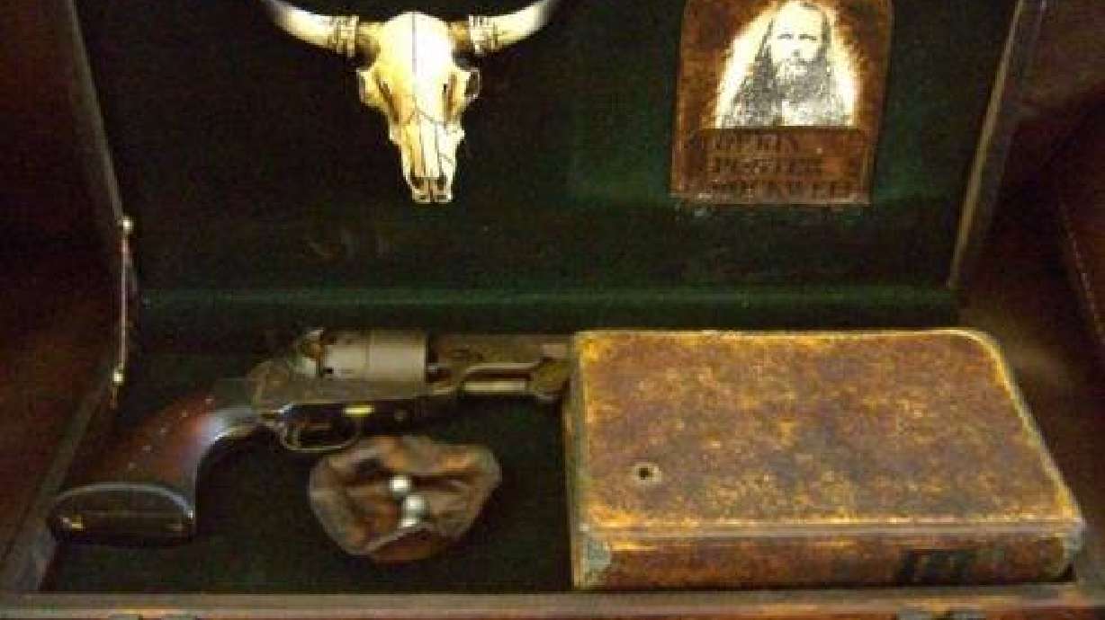 Antique pistol, first edition Book of Mormon stolen from Hurricane shop