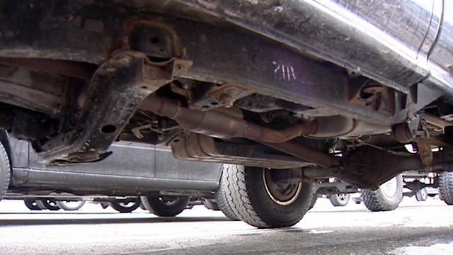 A catalytic converter on a pickup truck