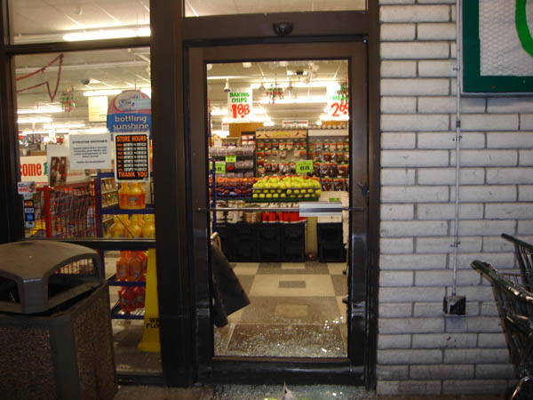 Glass is broken at the Reams store on State Street in South Salt Lake.