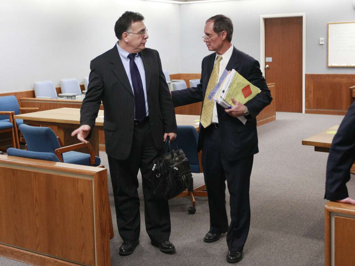 Coleman Nocks of Bountiful, Utah, left, appears with his attorney Bruce Larsen before the Second District Court in Layton, Utah Tuesday, January 4, 2011. (Pool photo by Matthew Arden Hatfield)