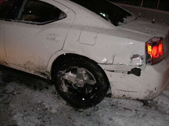 Damage to Utah Highway Patrol trooper's vehicle, caused by collision early Sunday morning on the 4500 South on-ramp to I-15. (Photo courtesy Utah Department of Public Safety)