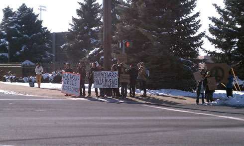 A small group of people gathered on the west end of the BYU campus to protest Condoleezza Rice's speech.