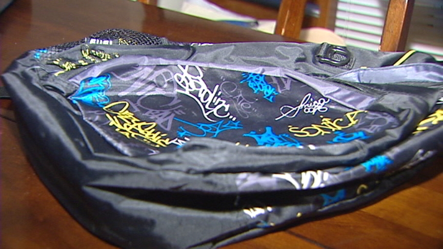 Officers searched Kaleb's backpack, which was decorated with fabric that looked spray-painted.