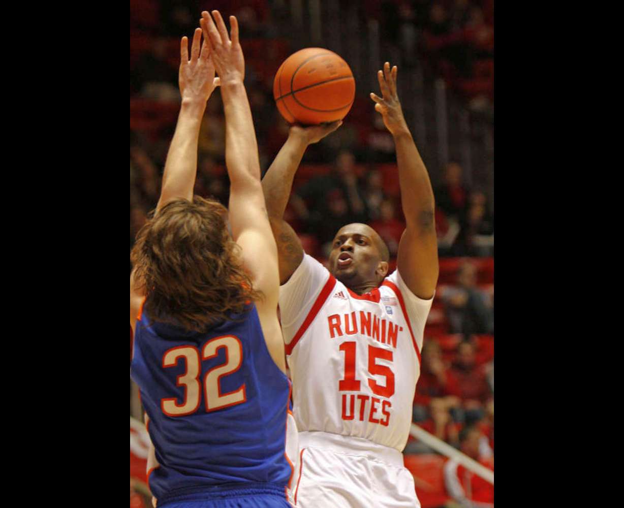 Utah's Josh Watkins shoots over Boise's Zack Moritz as the University of Utah and Boise State play men's basketball Friday, Dec. 17, 2010, in Salt Lake City, Utah. (Tom Smart, Deseret News)