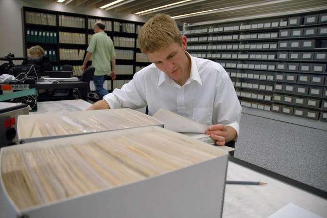 Isaac Goeckeritz reviews documents at the National Archives in Washington D.C. for his film, "Street Vets." The documentary profiles the lives of 10 veterans who struggled with drug addictions and homelessness after the Vietnam War.
