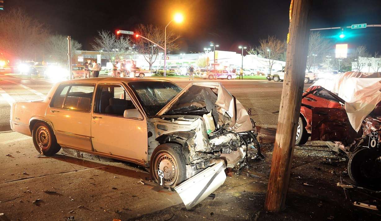 Police investigate a crash that killed Blake Strebel, 19, and Derek Jasper, 18, on April 22, 2009.