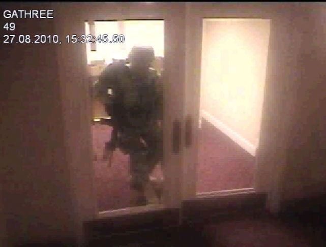 Army Spc. Brandon Barrett was wearing body armor and military fatigues when he was shot and killed by a Salt Lake City police officer who returned fire in an August 27, 2010 shootout at a downtown intersection near the Grand America Hotel in Salt Lake City, Utah. This is a frame grab from security video.