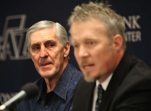 Utah Jazz coach Jerry Sloan listens to Greg
Miller after announcing his resignation on Feb.
10, 2011. (Deseret News)