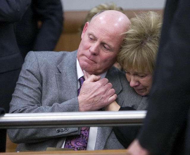 Kiplyn Davis' parents, Richard and Tamara Davis,hold each other in relief at the end of the hearing in 3rd District Court Thursday, Feb. 10, 2011. Timmy Brent Olsen pleaded guilty to manslaughter in Kiplyn's death.
(Scott G. Winterton, Deseret News)