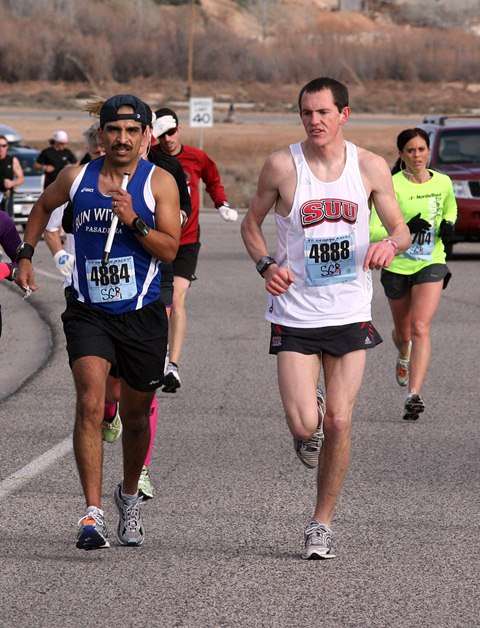 Blind runner Adrian Broca, left, and running guide Clinton Rhoton, right, compete during the St. George Half Marathon Saturday Jan. 22, 2011. (Taylor Wilson, KSL 5 News)