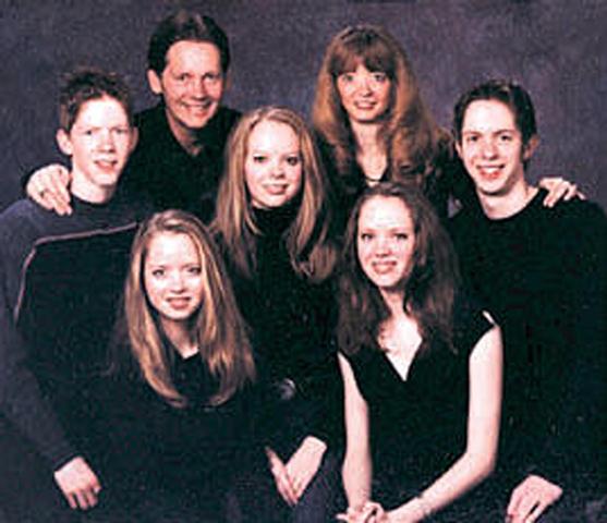 Keith and Lisa Brown, the parents of the 5 Browns, top of photo, are pictured in a family photo provided for a 2002 Deseret News article.