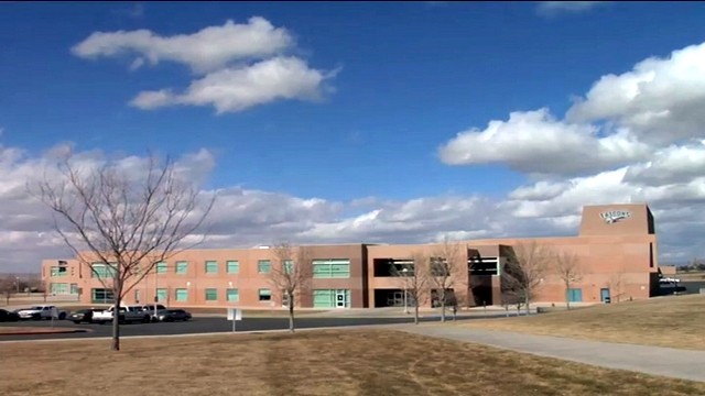 Ex-football coach charged with having players steal painkillers 