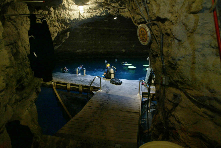 Family sues resort over son who died diving in The Crater