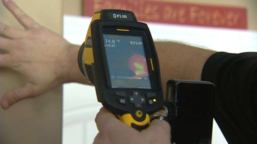 Home energy inspector Mitch Richardson used a thermal camera to detect where the heat was going in Shelly Bouvang's house.