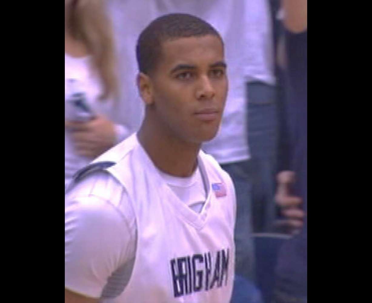 BYU starting forward Brandon Davies was dismissed from the men's basketball team Tuesday following an honor code violation.
