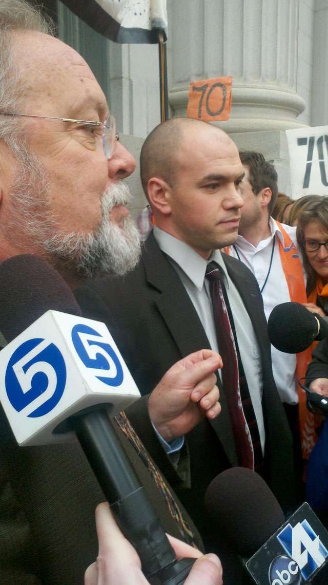 As DeChristopher left the courthouse, he was greeted by news cameras. (Sarah Dallof, KSL 5 News)