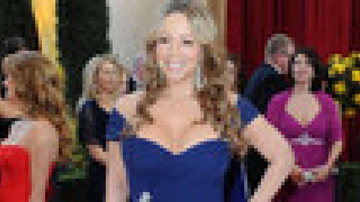 MARIAH CAREY - Mariah Carey embarrassed by Gaddafi performance