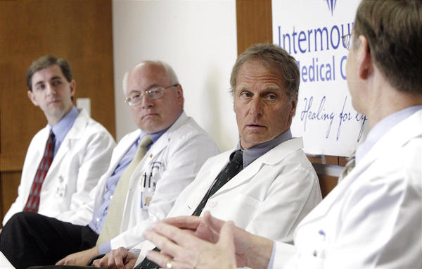 L-R: Doctors Ben Horne, Brent Muhlestein, John Carlquist and Jeffrey Anderson speak during a press conference in Salt Lake City, Utah, Friday, March 4, 2011. (Jeffrey D. Allred, Deseret News)