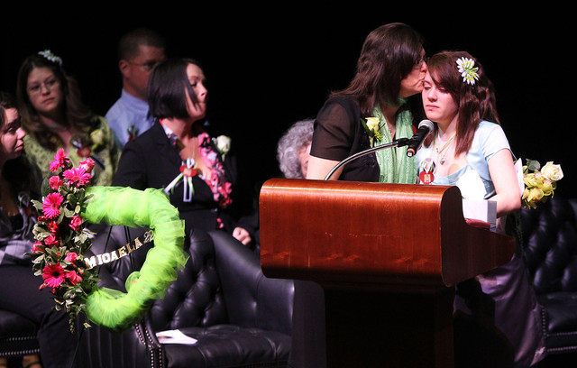Micaela's mother, Celia Costanzo, did not speak at the service, but sat closest to the podium and often offered a tissue or consoling hug to her daughters to help them get through their speeches.