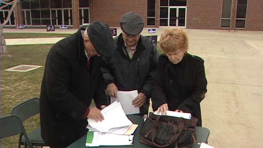Volunteers for "Repeal House Bill 477" sat outside the Utah County Republican meeting Saturday, trying to gather signatures. The group needs 96,372 signatures in a little more than a month.
