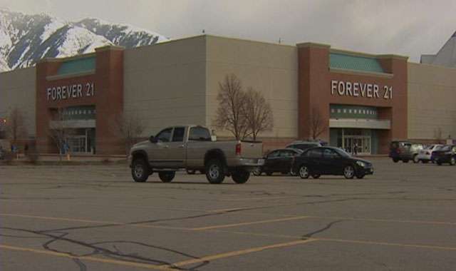 Heather Seamons says she was trying on dresses at the South Towne Mall's Forever 21 store when she noticed someone trying to take pictures of her with a cell phone.