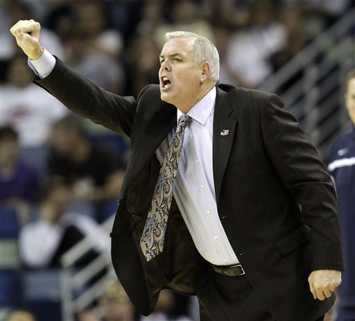 BYU head coach Dave Rose calls out to his team during the first half of the NCAA Southeast regional college basketball semifinal game against Florida. (AP Photo/David J. Phillip)