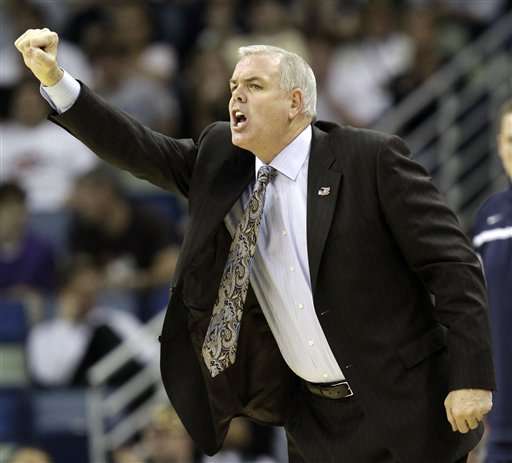 BYU head coach Dave Rose calls out to his team during the first half of the NCAA Southeast regional college basketball semifinal game against Florida. (AP Photo/David J. Phillip)
