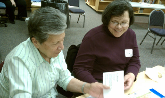Volunteers with Ogden Utah LDS Stake getting ready to tutor kids at Taylor Elementary School.
