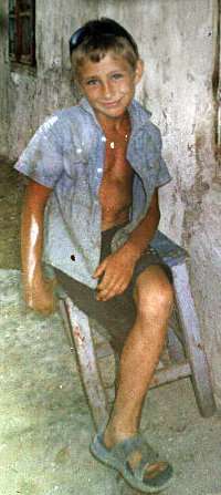 Marius Dasianu is pictured before the fire that severely burned his face and hands and claimed his parents in Romania. (Courtesy Team Marius)