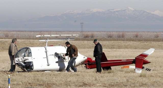 A helicopter pilot made a hard landing Tuesday, March 1, 2011 at the Tooele Valley Airport that resorted in the chopper laying on its side with an obvious broken tail rotor. The chopper was owned by Upper Limit Aviation in Salt Lake City. (Ben Tidswell, KSL News)