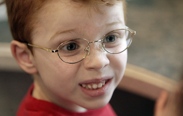 Lincoln Elementary kindergarten student Duncan Webb likes his new pair of eyeglasses in Salt Lake City on Tuesday. (Jeffrey D. Allred, Deseret News)