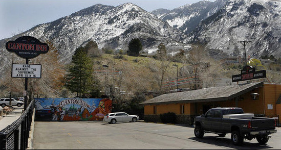 A mural borders the parking lot of the Canyon Inn Restaurant & Lounge in Cottonwood Heights, Friday, April 15, 2011.
