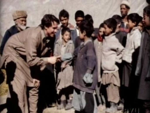 Greg Mortenson meets with Middle Eastern children. His organization, which helps to provide them with an education, has come under fire following a "60 Minutes" report that alleges dishonesty.