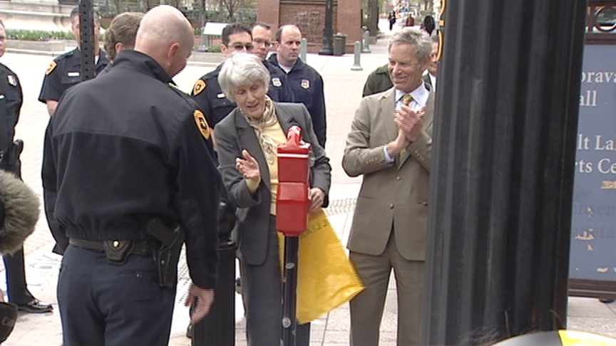Salt Lake City Police Chief Chris Burbank, homeless advocate Pamela J. Atkinson and Salt Lake City Mayor Ralph Becker unveiled the new meters Thursday.