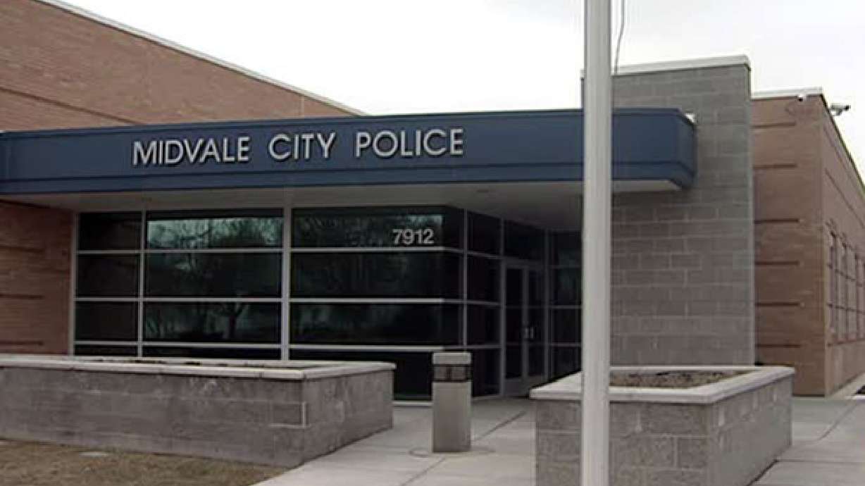 Midvale man charged with terrorist threats of taking gun into schools