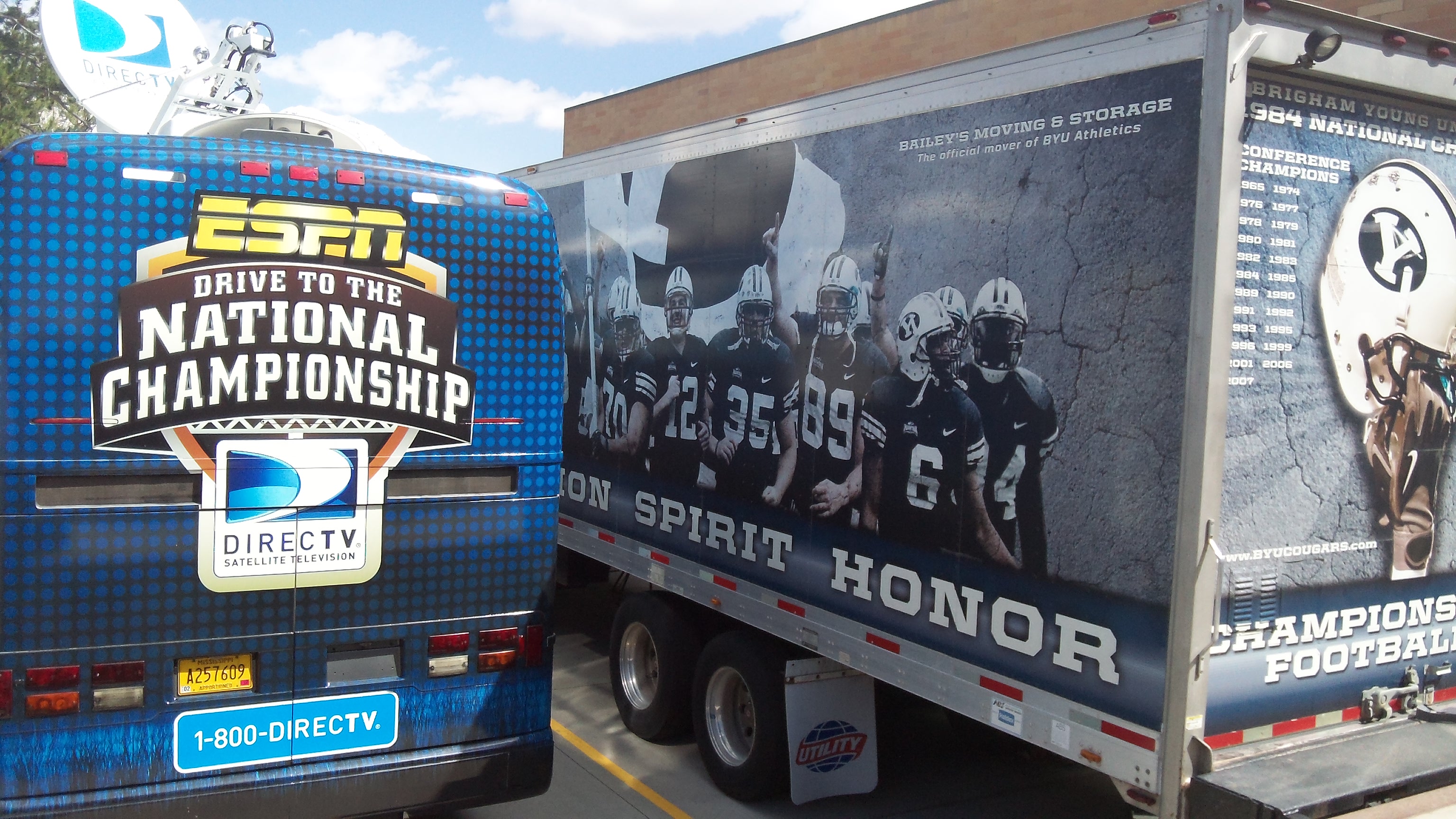 Big Wheels: the ESPN bus pulled in next to the BYU truck.