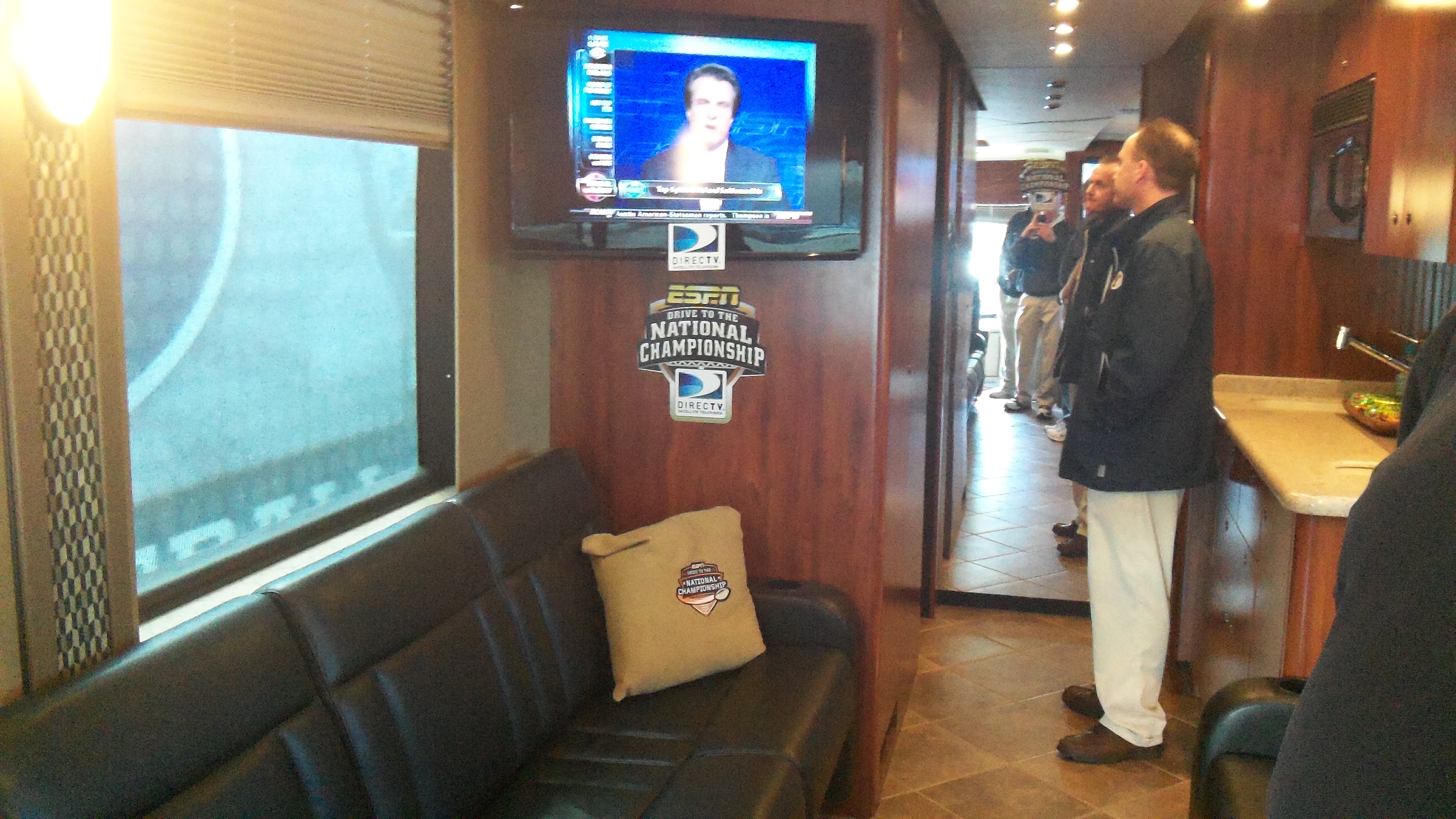 A view from the front of the bus toward the studio at the back.