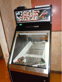 The machine is a version of those often found in video arcades: Coins go in, and potentially lots of coins -- and possibly cash -- come out.