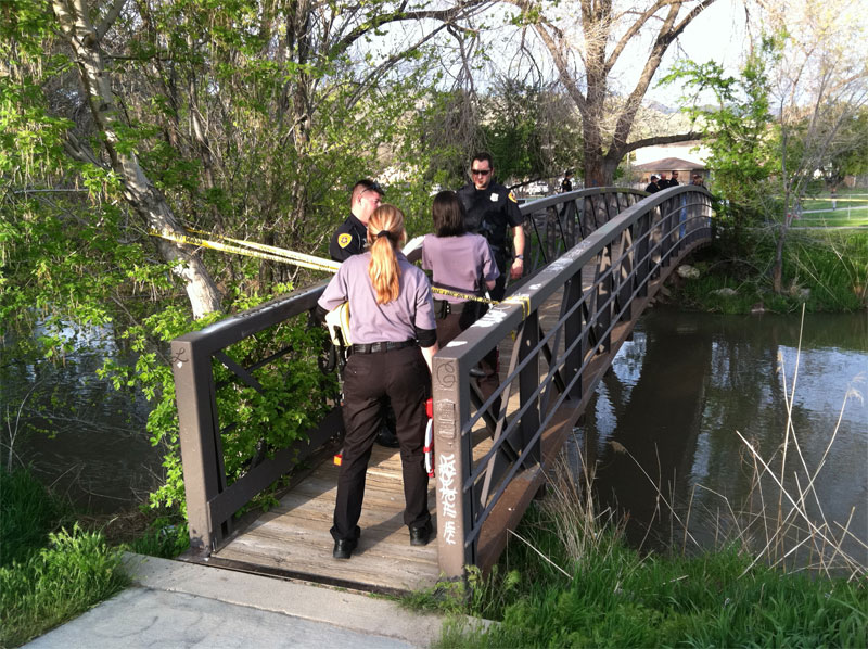 Witnesses say the gunman was riding a bicycle on the trail and dumped the gun in the river.