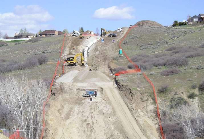 This photo of a different pipeline project shows how far houses and properties must be from a pipeline.