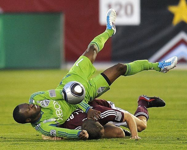 Seattle midfielder Steve Zakuani suffered a broken leg against the Coloardo Rapids earlier this year. Referees have enough power to prevent some of these injuries by noticing problems early. (KARL GEHRING/AP)